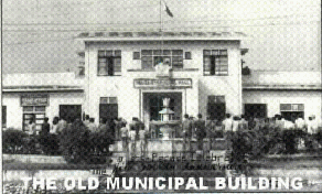Miagao Municipal Building, The lot where the present municipal hall stands was occupied by the pre-war Miagao Intermeidate School.  It was constructed during the first term of Mayor Mueda (1952-55) at a cost of Php50,000 from the pork-barrel fund of then Congressman Pedro Trono.A semi-concrete structure, the ground floor houses the treasury office, police force, municipal court, post-office, telecommunications, the Comelec, and the agrarian reform team, and the second floor is the mayor's office and session hall.